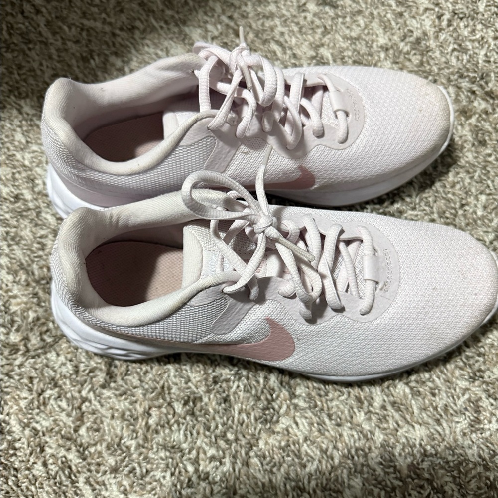 Nike Pink Sneakers with Minimalist Design